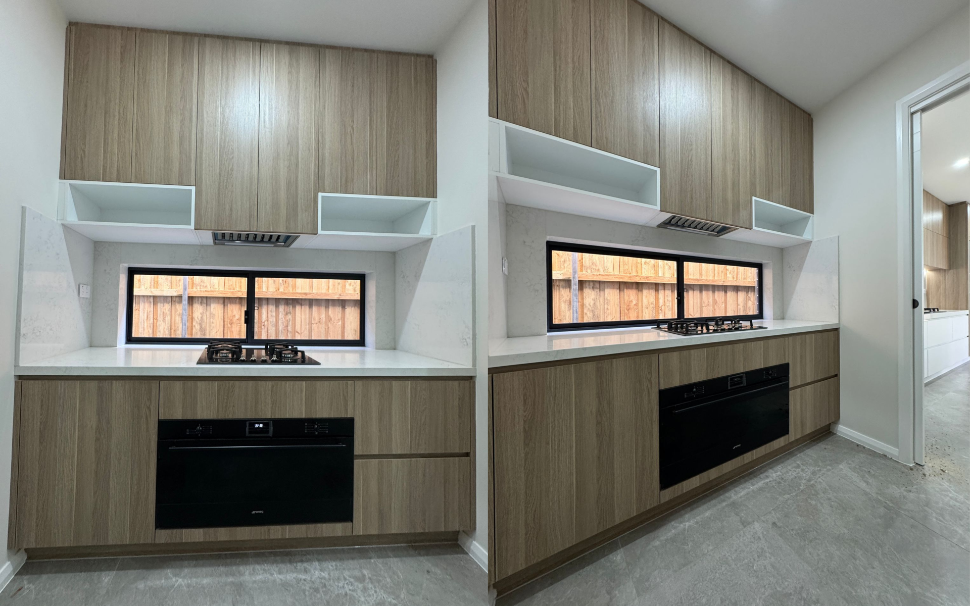 Modern kitchen with white quartz island, wood-grain cabinetry, black appliances and pendant lighting