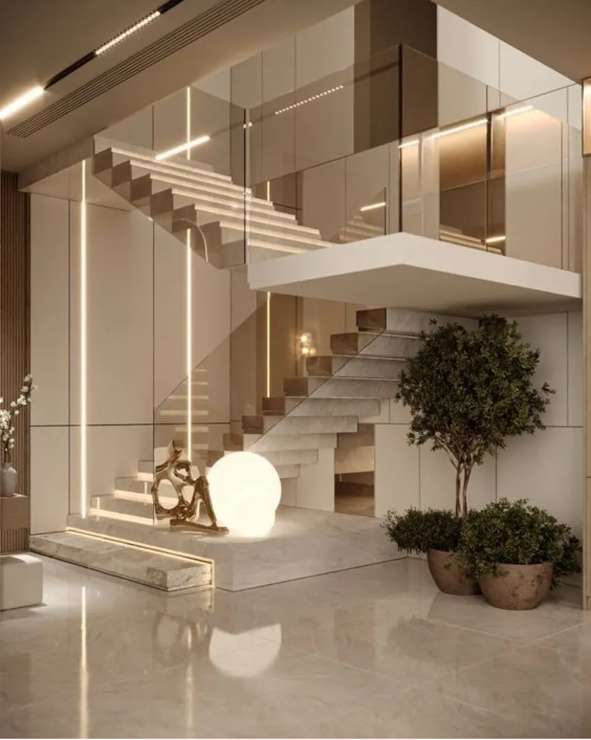 Modern luxury interior with floating staircase, glass balustrades, wall panelling and integrated LED lighting